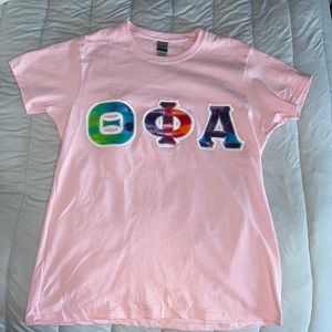 Theta Phi Alpha Pink T-Shirt with Tie Dye Letters (Medium)